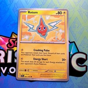 rotom (061/191) - common — pokémon: surging sparks